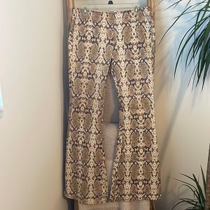 Free people snake print bell bottoms. Worn once!
